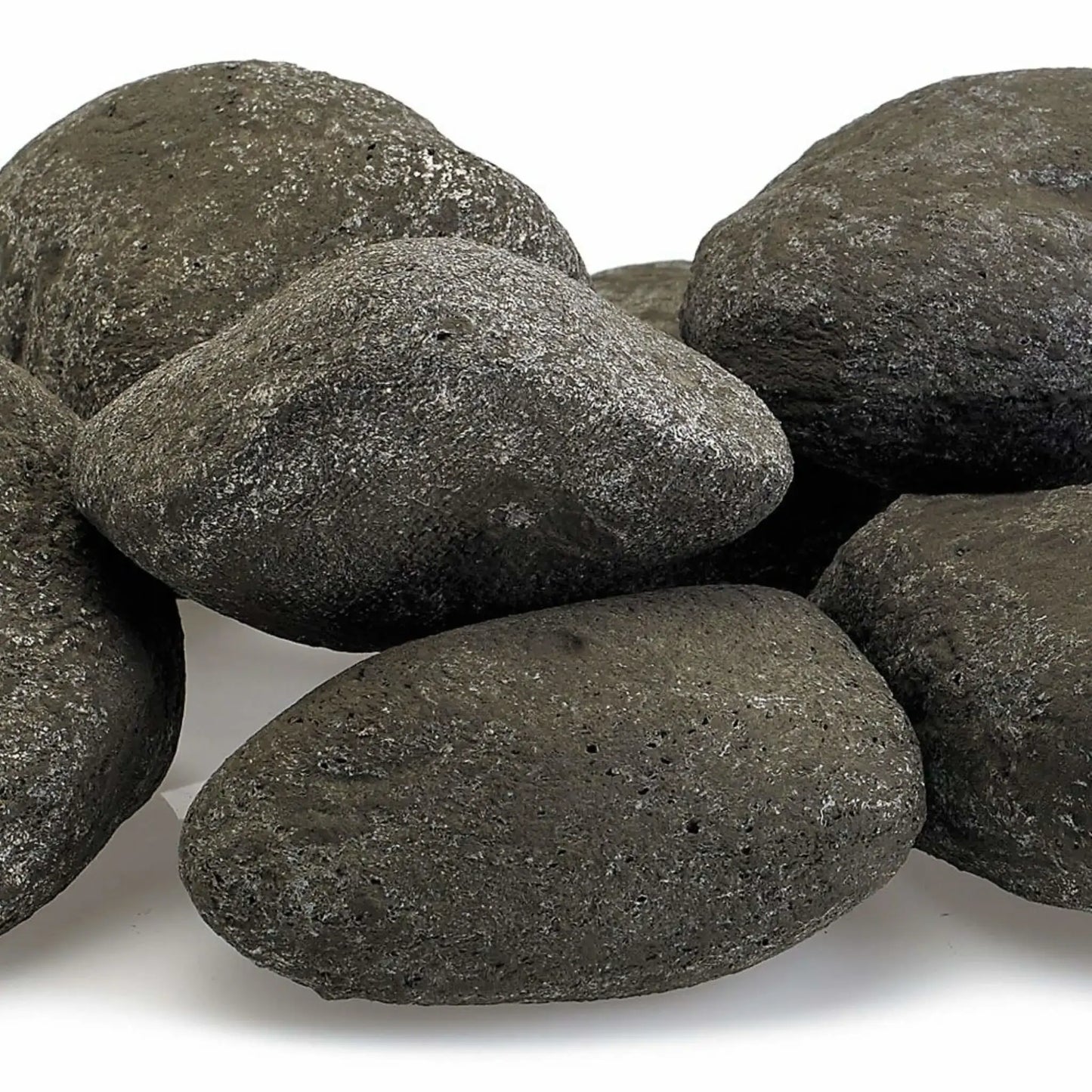 Close-up of Thunder Gray Lite Stones by American Fire Products highlighting rich dark gray color, natural stone texture, and rounded edges ideal for contemporary gas fire features.