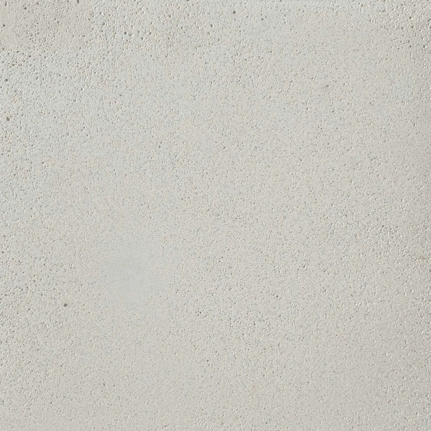 Close-up view of Flame Havens Concrete GFRC Glass Fiber Reinforced Concrete Swatch White V4 finish featuring a clean ivory-white concrete texture with subtle pores, fine aggregate detail, and a smooth matte surface. The GFRC finish is designed for contemporary outdoor fire pits, modern patio fire tables, and durable all-weather concrete fire feature installations.