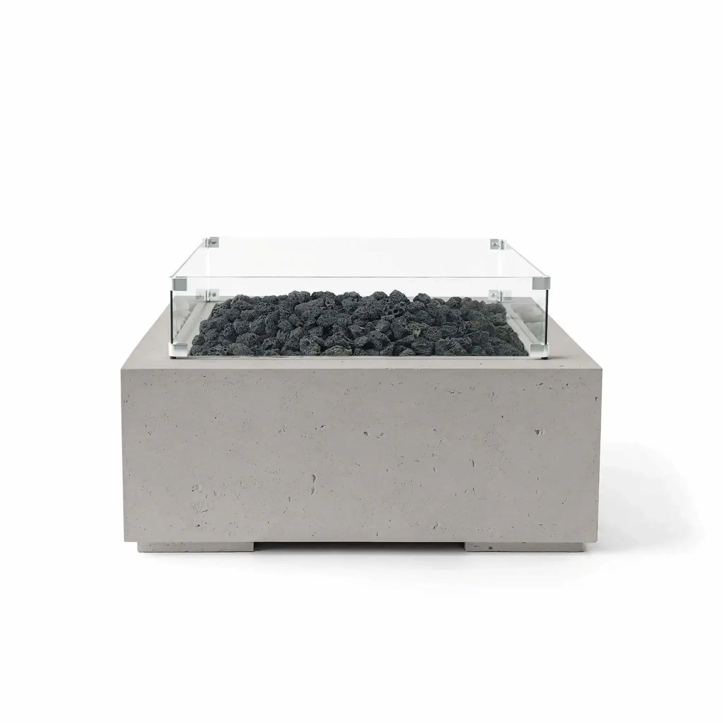 Front view of the HPC Fire Hearth Products Controls Dekko GFRC Concrete Alea 32 x 32 Fire Pit in Sandstone finish with black lava rock media and a tempered glass wind guard. The square GFRC concrete fire feature combines warm neutral tones, contemporary design, and rugged lava rock accents, shown in a professional white-background product photograph.