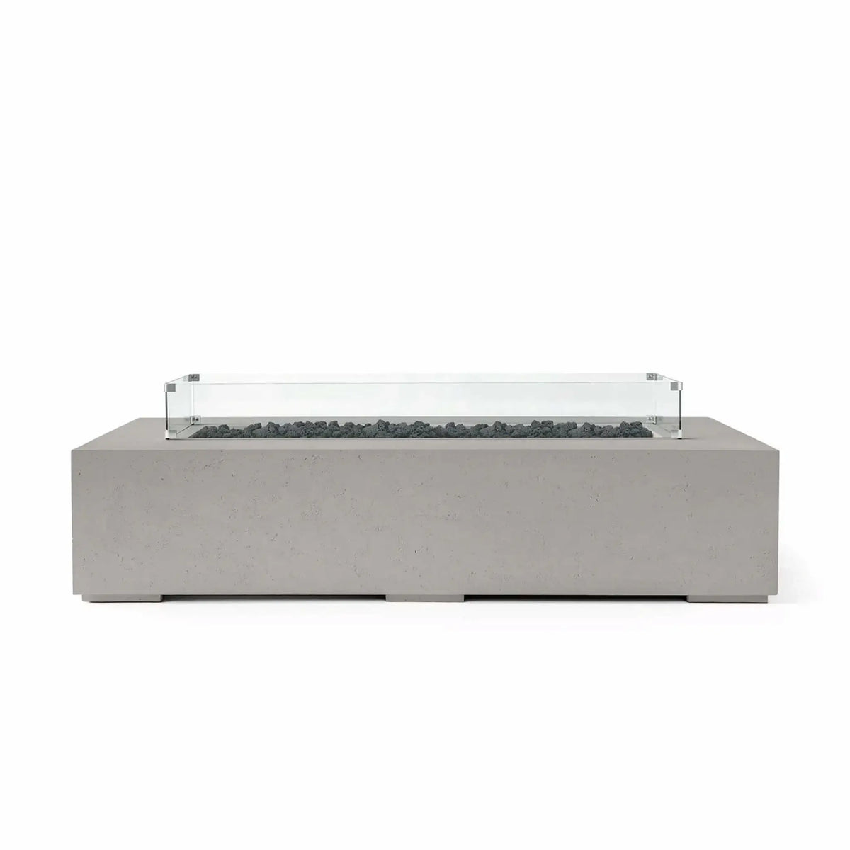 HPC Fire Hearth Products Controls Dekko GFRC Concrete Sonoma 72 x 33 Fire Pit in Sandstone finish featuring black lava rock media and a tempered glass wind guard. The modern rectangular fire table combines textured GFRC concrete construction with contrasting dark fire media, delivering a stylish outdoor focal point for upscale patios, decks, and entertainment spaces.