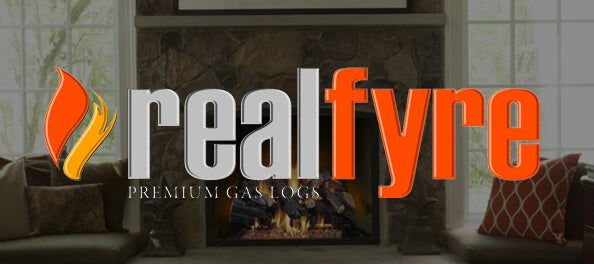 A large 'realfyre' logo with an orange flame icon and the text 'PREMIUM GAS LOGS' overlaid on a living room scene featuring a stone fireplace with a fire burning inside.