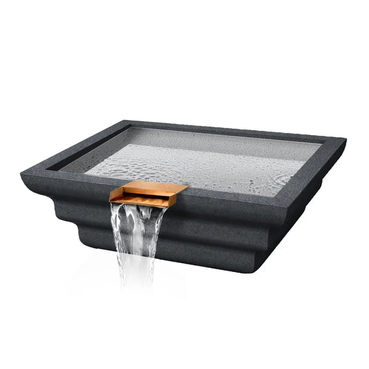 Angled product view of the Flame Havens Serenity Series ripple square rounded water bowl in a dark graphite finish. The modern square basin features layered ripple-style exterior contours and a copper scupper spillway that pours a smooth sheet of water over the front edge. The basin surface shows gentle water movement, highlighting the architectural pool water feature designed for luxury outdoor pools and landscapes.