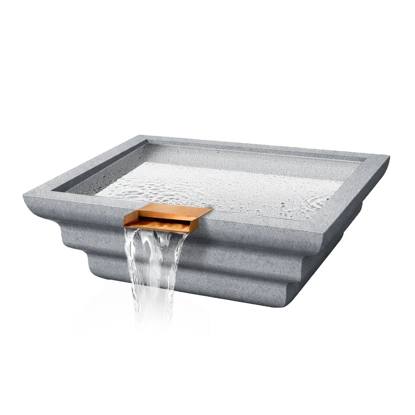 Angled product image of the Serenity Series ripple square water bowl in a light gray stone finish. The layered ripple exterior profile surrounds a square basin filled with gently moving water, while a copper scupper spillway extends from the front edge, creating a smooth waterfall sheet designed for decorative poolside installations.