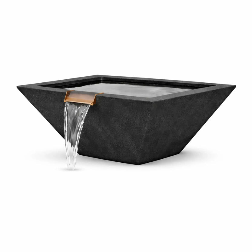 Angled product view of a black square angular GFRC concrete water bowl with a bronze spillway releasing a steady waterfall. The image emphasizes the bowl’s bold geometric form, dark concrete finish, and modern design suitable for contemporary outdoor installations.