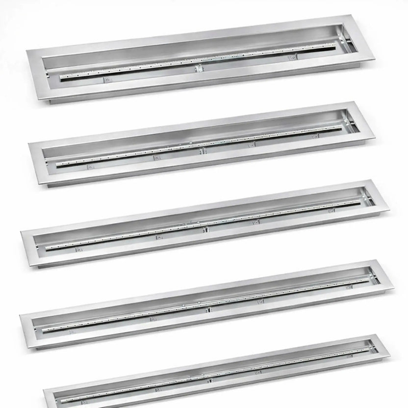 American Fire Products linear stainless steel drop-in burner pans shown in multiple lengths, featuring a brushed stainless finish, rectangular fire pan design, and integrated gas burner tube for modern outdoor fire pits and fire tables.