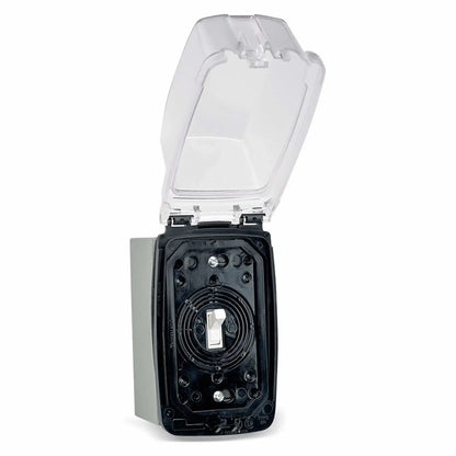 Open weatherproof outdoor electrical box revealing a standard white ON/OFF toggle wall switch inside, protected by a hinged transparent cover and rugged gray housing for exterior electronic ignition installations.