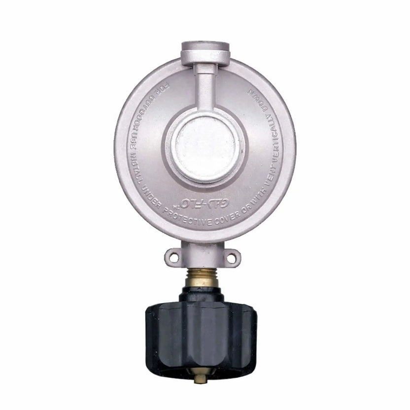 Close-up view of a round propane gas regulator with integrated pressure control, silver metal housing, and black adjustment knob, designed for safe connection between a propane tank and an outdoor fire pit or gas appliance.