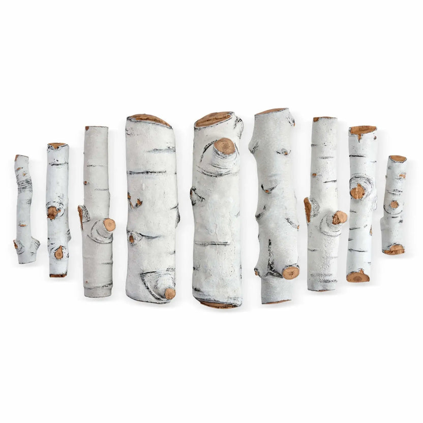 Nine individual Sierra Birch ceramic gas fire pit logs laid out separately on a white background, displaying varied lengths, branch-style shapes, and authentic birch bark detailing with exposed wood ends for custom log placement in gas fire pits.