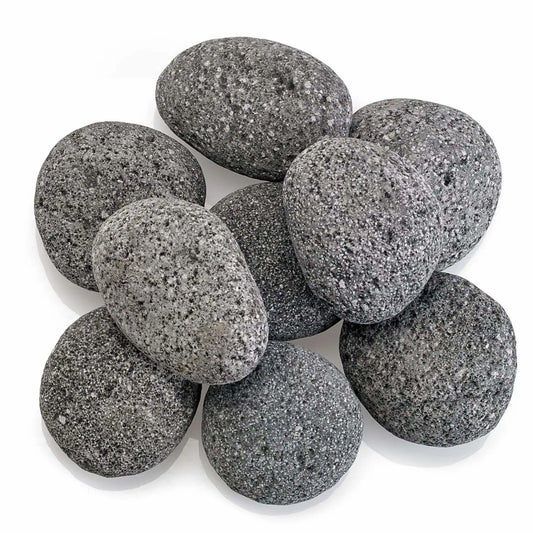 Top-down view of Large gray lava stones arranged in a clustered layout, showing their rounded edges, natural variation in tone, and porous volcanic texture on a clean white surface.