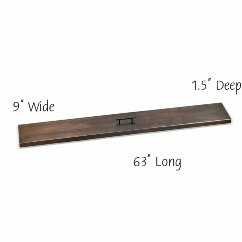 60-inch linear fire pit burner cover in oil rubbed bronze, built with a slim rectangular footprint to shield burners from debris while blending into modern outdoor designs.
