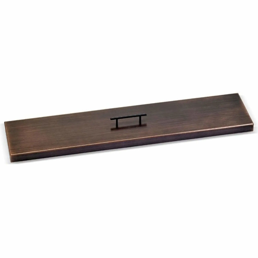 Linear oil rubbed bronze fire pit burner cover with a smooth brushed metal finish and centered low-profile handle, designed to protect outdoor fire pit burners when not in use.