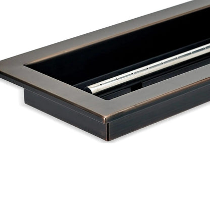 Corner close-up of an oil rubbed bronze linear drop-in burner pan by American Fire Products, showing the folded steel construction, finished edge detail, and recessed pan depth designed for durability and clean installation.