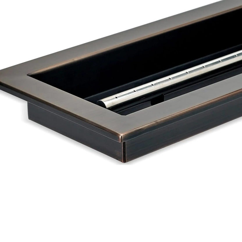 Corner close-up of an oil rubbed bronze linear drop-in burner pan by American Fire Products, showing the folded steel construction, finished edge detail, and recessed pan depth designed for durability and clean installation.