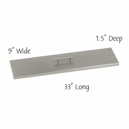 30-inch by 6-inch stainless steel linear burner cover featuring a slim rectangular profile, brushed metal surface, and centered handle for easy removal when converting a fire pit to a tabletop.