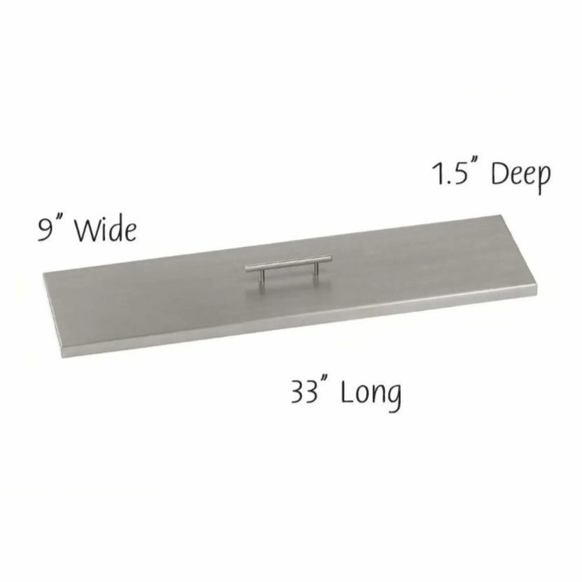30-inch by 6-inch stainless steel linear burner cover featuring a slim rectangular profile, brushed metal surface, and centered handle for easy removal when converting a fire pit to a tabletop.