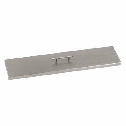 Linear stainless steel fire pit burner cover with a smooth brushed finish and centered lift handle, shown on a white background to highlight its low-profile design and corrosion-resistant construction.