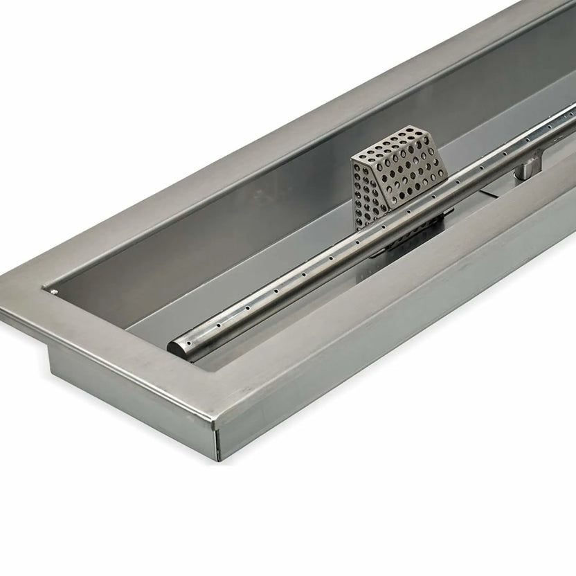 Close-up corner detail of a linear stainless steel drop-in fire pit pan by American Fire Products, highlighting the smooth welded edges, brushed stainless finish, and precision-cut construction designed for CSA-certified outdoor fire features.