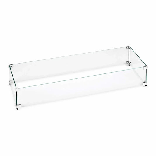 Linear tempered glass wind guard designed for rectangular fire pits, featuring clear glass panels secured with metal corner brackets, shown assembled to protect flames from wind while maintaining an open, modern look.