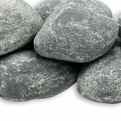 Close-up view of American Fire Products Lite Cobble Stones in Cape Gray, featuring smooth, rounded fire pit stones with a soft gray tone and natural white speckled texture, designed to mimic real river rock for gas fire features.