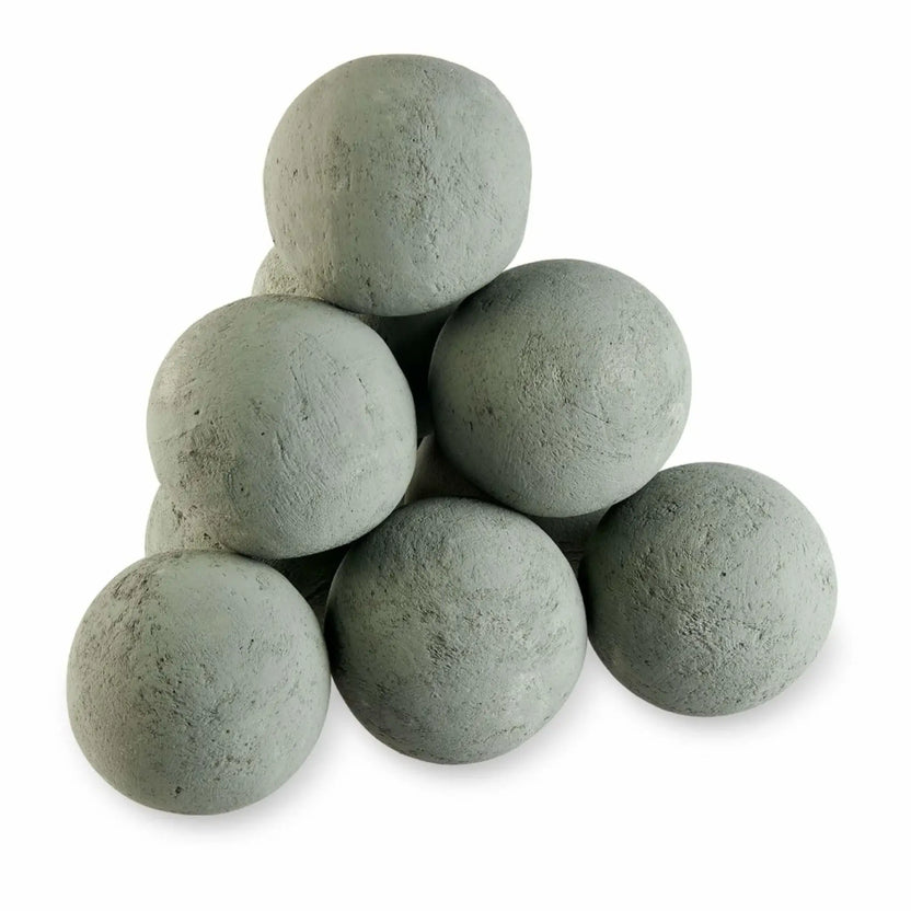 Pyramid-style stack of Cape Grey 4-inch lite-stone fire balls on a white background, highlighting the matte gray finish and natural stone-like texture.