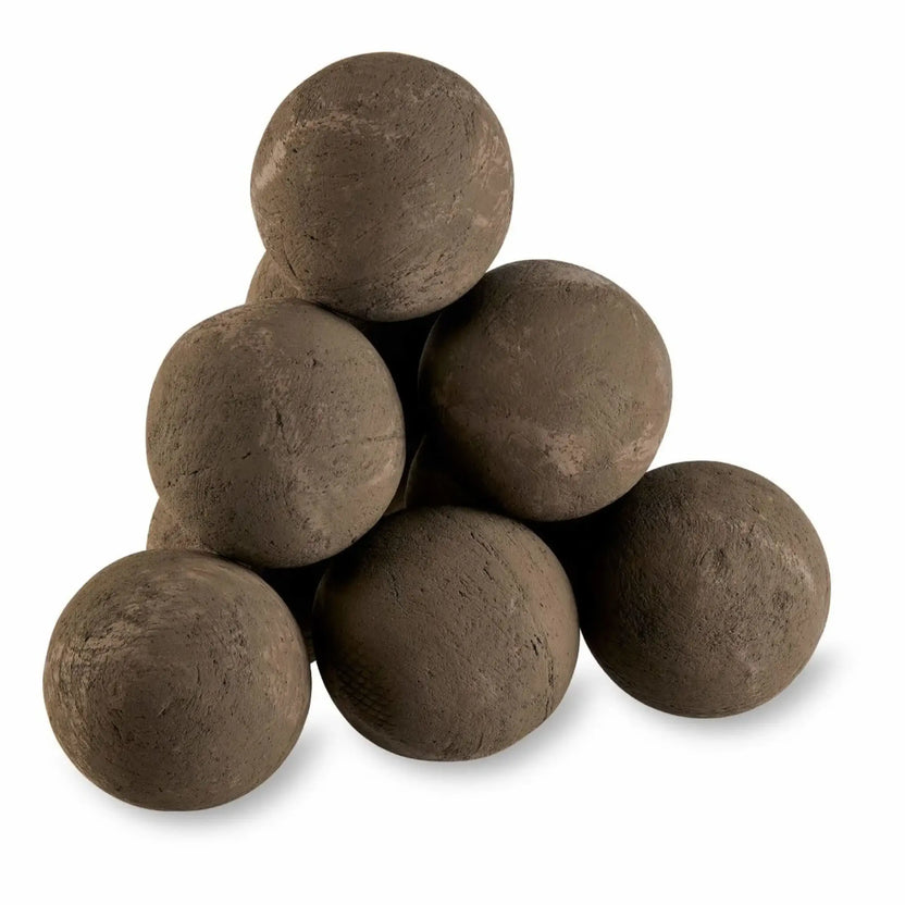 Stacked Thunder Gray lite stone fire balls arranged in a compact pyramid formation, highlighting the rounded shape and subtle texture of decorative concrete fire pit media against a clean white background.