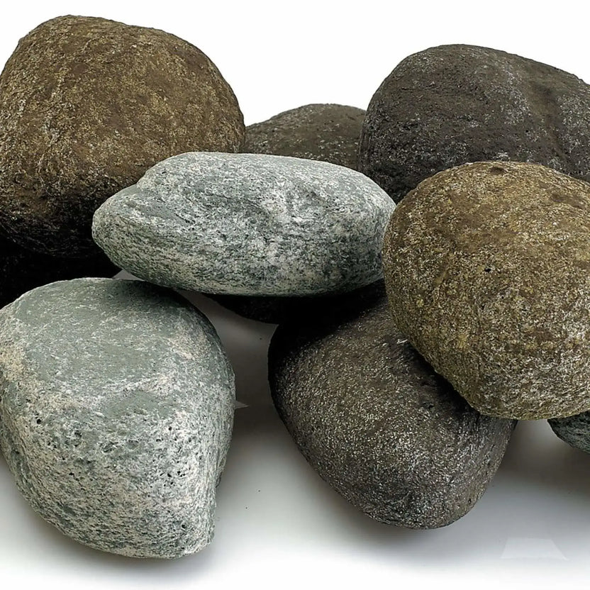 Close-up top view of Natural Lite Stones by American Fire Products showing detailed stone textures, subtle color variation, and smooth edges designed for gas fire pits and fire tables.