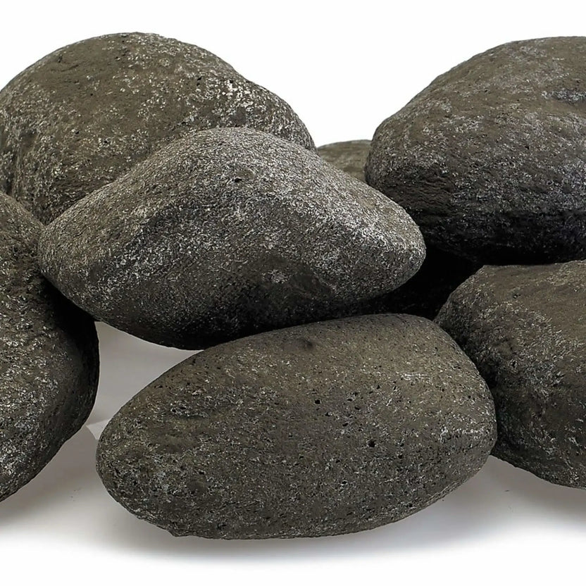 Close-up of Thunder Gray Lite Stones by American Fire Products highlighting rich dark gray color, natural stone texture, and rounded edges ideal for contemporary gas fire features.
