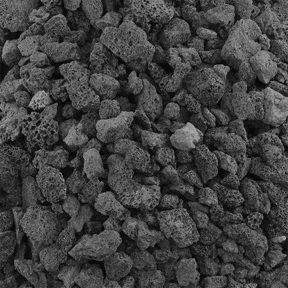Close-up of medium size black lava rock showing rough, porous volcanic texture designed for improved gas flow and even flame distribution in fire pits and fireplaces.