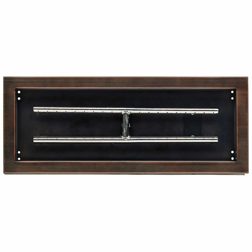 Close-up overhead view of a 24 by 8 inch oil-rubbed bronze drop-in burner pan, showing the internal burner layout and clean rectangular frame designed for custom fire pit installations.