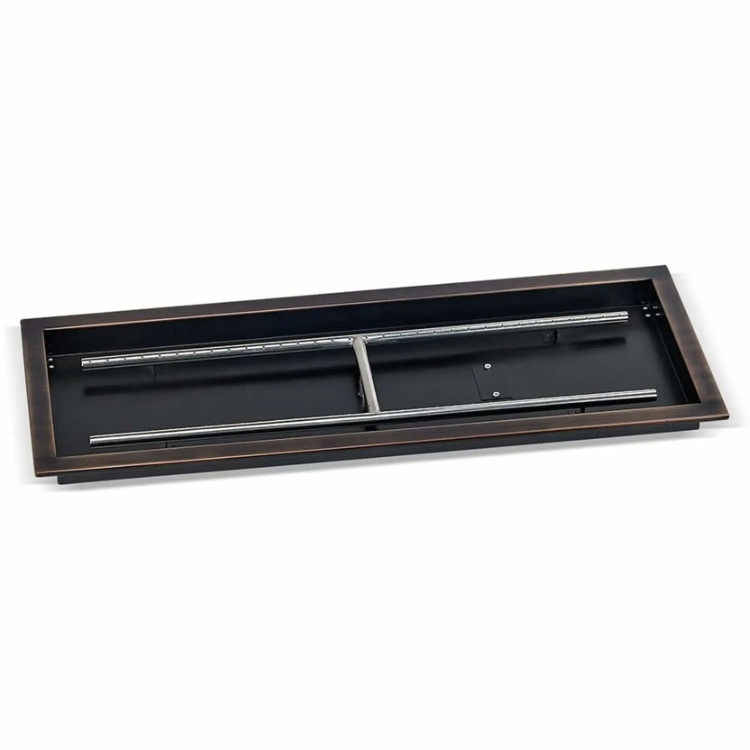 Angled studio image of a 36x12 rectangular oil rubbed bronze drop-in burner pan, highlighting the wide pan opening, dark bronze frame, and stainless steel burner assembly designed for medium to large outdoor fire pits.