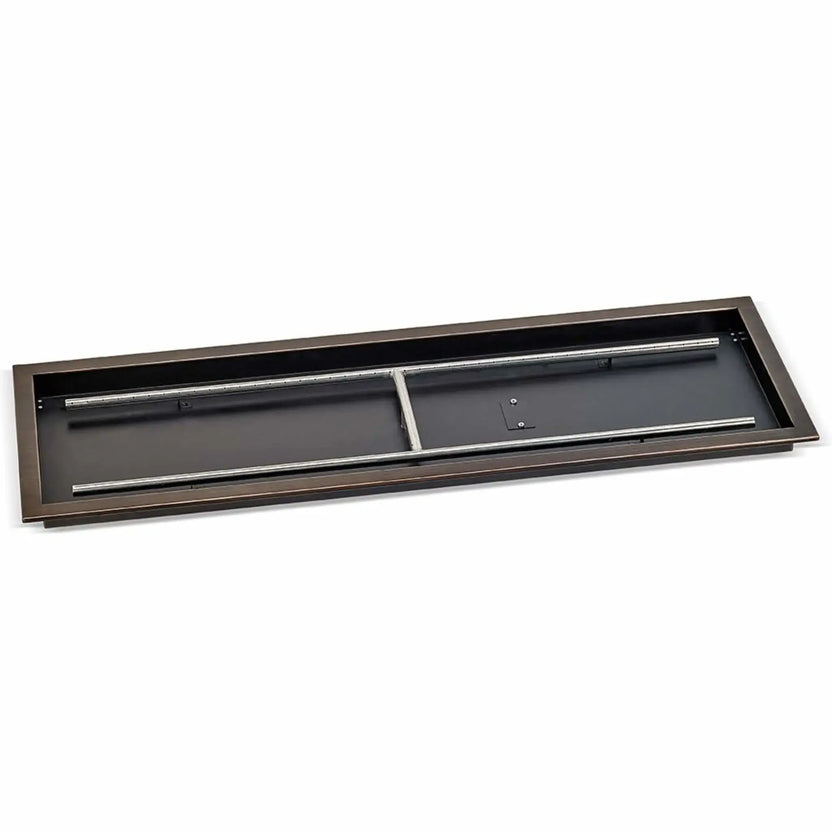 Large rectangular oil rubbed bronze drop-in burner pan measuring 48 by 14 inches, photographed at an angle to display the deep pan walls, wide fire opening, and stainless steel burner bars for high-output fire features.