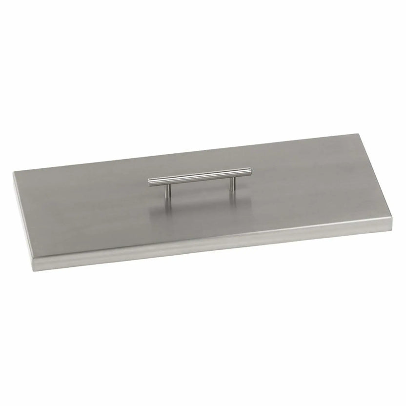 Rectangular stainless steel fire pit burner cover with a brushed metal finish and integrated lift handle, designed to protect gas burners from debris while creating a clean, modern tabletop appearance.