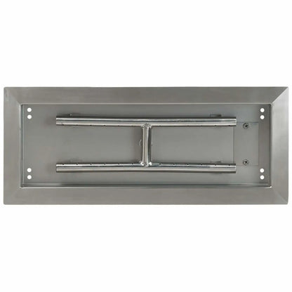 Top-down view of an 18 by 6 inch stainless steel rectangular drop-in burner pan, highlighting the clean pan interior, stainless steel burner tubes, center support bracket, and precision-drilled flame ports.