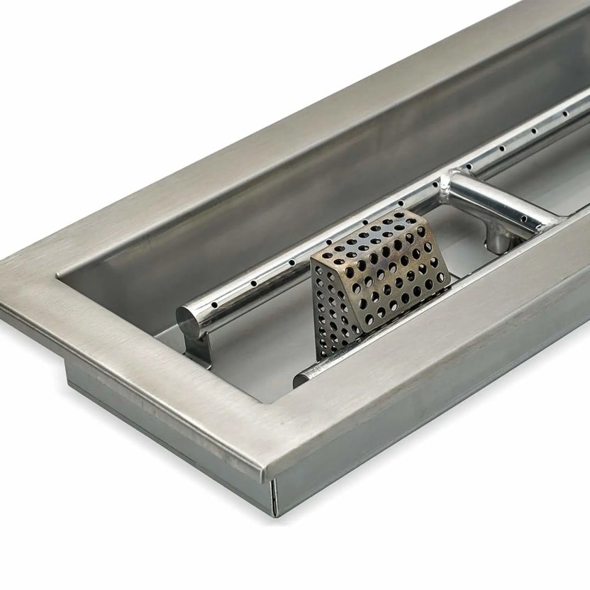 Close-up detail of a stainless steel rectangular fire pit pan highlighting the brushed metal finish, clean welds, and precision-cut edges of the drop-in fire pit design.