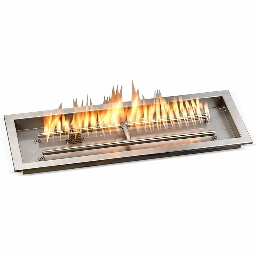 30-inch by 10-inch stainless steel rectangular fire pit pan operating with tall, bright flames across the linear burner, highlighting the clean modern design, smooth steel edges, and consistent flame distribution inside the drop-in fire pit pan.