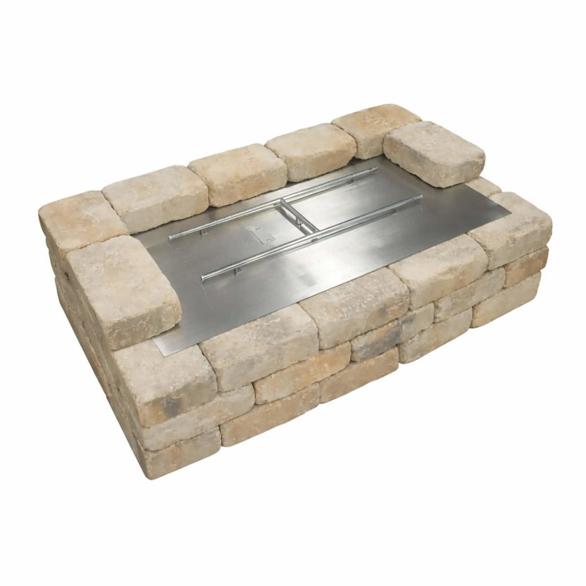 Installation diagram illustrating proper placement and ventilation requirements for a rectangular stainless steel flat fire pit burner pan within a masonry or hardscape fire pit structure.
