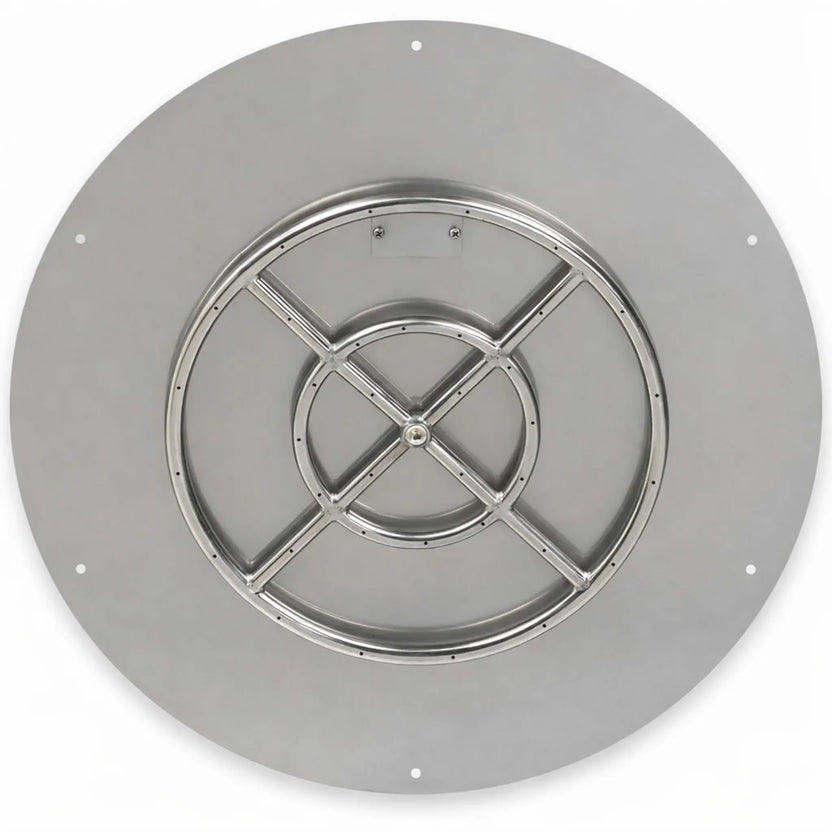 Overhead view of a round stainless steel flat fire pit burner pan showing a central gas inlet, circular burner ring with uniform flame ports, and a smooth perimeter flange, engineered for consistent flame distribution in outdoor fire pit builds.