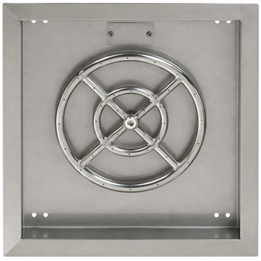 Overhead view of a square stainless steel fire pit burner pan highlighting the round burner ring and internal cross supports. The stainless pan includes corner mounting holes and a recessed interior designed to hold decorative fire media.