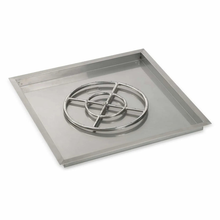 Large square stainless steel drop-in fire pit burner pan designed for custom outdoor installations. Features a centered circular burner ring, clean welded corners, and a deep basin for fire glass or lava rock media.