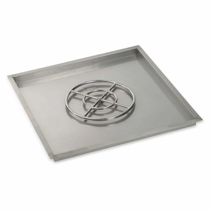 Extra-large square stainless steel drop-in fire pit burner pan with a full-size circular burner assembly. The pan features a brushed stainless finish, wide flanged edges, and a robust design suited for larger outdoor fire pit projects.