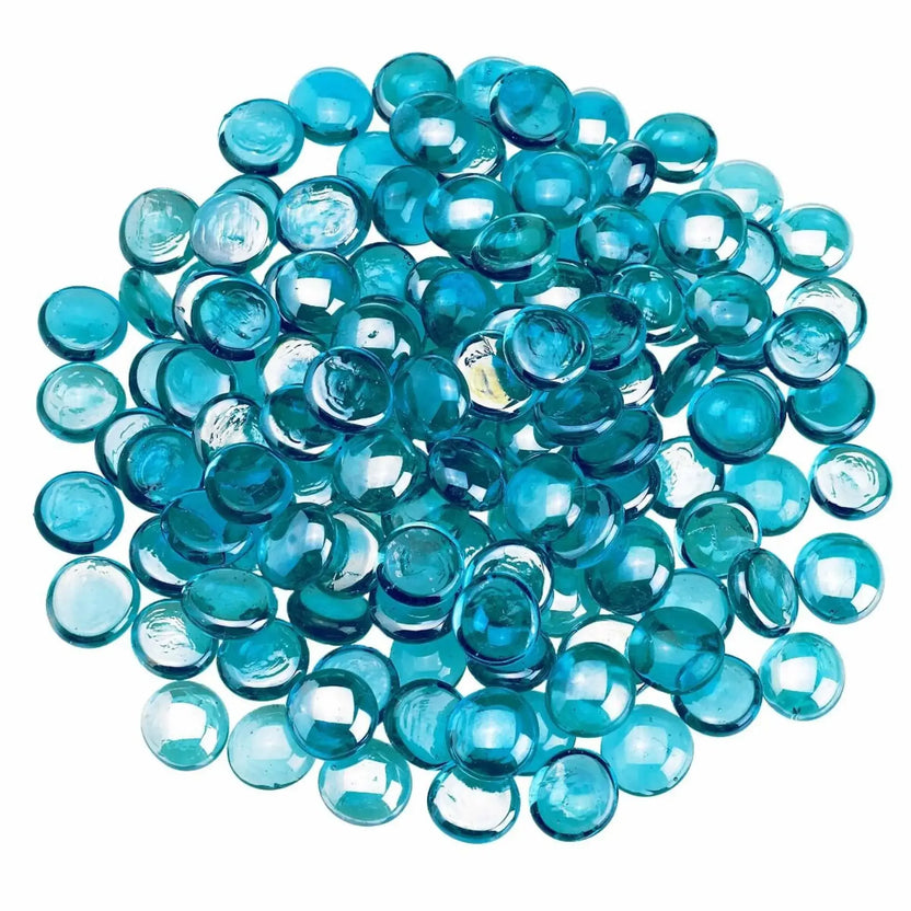 Top view of aqua blue tempered glass fire pit beads arranged in a circular pile, highlighting the smooth rounded drop shape, glossy luster finish, and vibrant ocean-toned color.