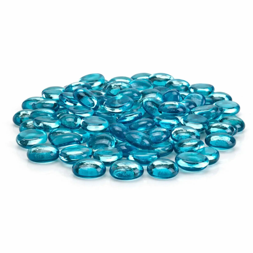 Pile of aqua blue tempered glass fire pit beads with a glossy luster finish, rounded drop shape, and smooth polished surface, displayed against a clean white background.