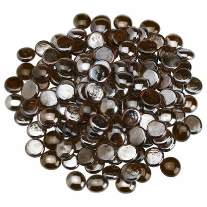 Overhead view of root beer brown tempered glass fire pit beads arranged in a loose circular pile, showcasing their rich amber tone, rounded drop shape, and glossy luster finish against a white background.