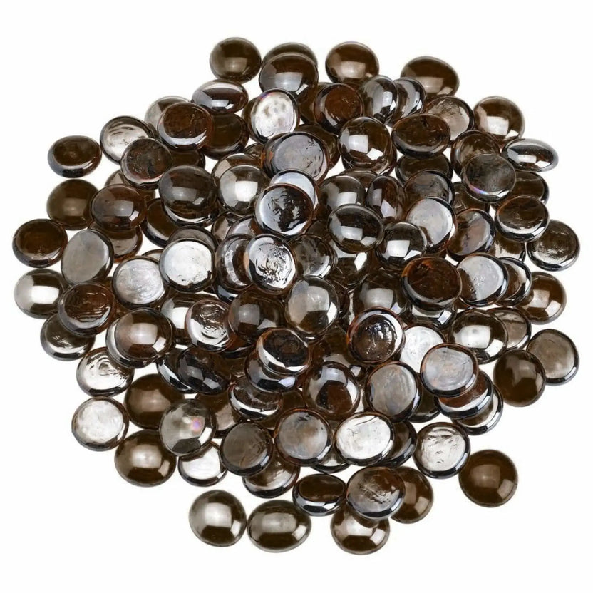 Overhead view of root beer brown tempered glass fire pit beads arranged in a loose circular pile, showcasing their rich amber tone, rounded drop shape, and glossy luster finish against a white background.