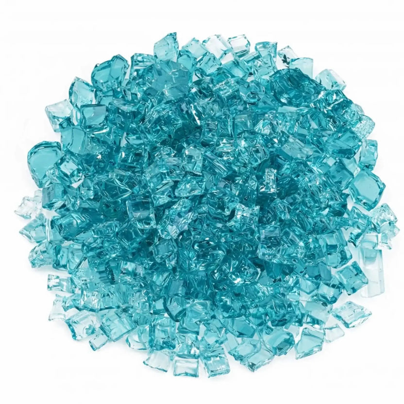 Top-down view of Azuria 1/2 inch Classic Non-Reflective tempered fire glass showing a dense layer of aqua-blue glass pieces with smooth edges and subtle matte sheen, ideal for covering linear gas fire pit burners.
