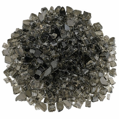 Top-down view of 1/2 inch Classic Non-Reflective Bronze tempered fire glass arranged in a full circular pile, highlighting the mix of translucent smoky hues and darker bronze pieces ideal for evenly covering a gas fireplace burner pan.