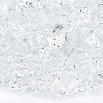 Macro close-up of 1/2 inch non-reflective Starfire Ultra Clear tempered fire glass pieces, showing brilliant clarity, subtle internal texture, and smooth tumbled surfaces that allow natural gas flames to shine through with bright, crisp illumination.
