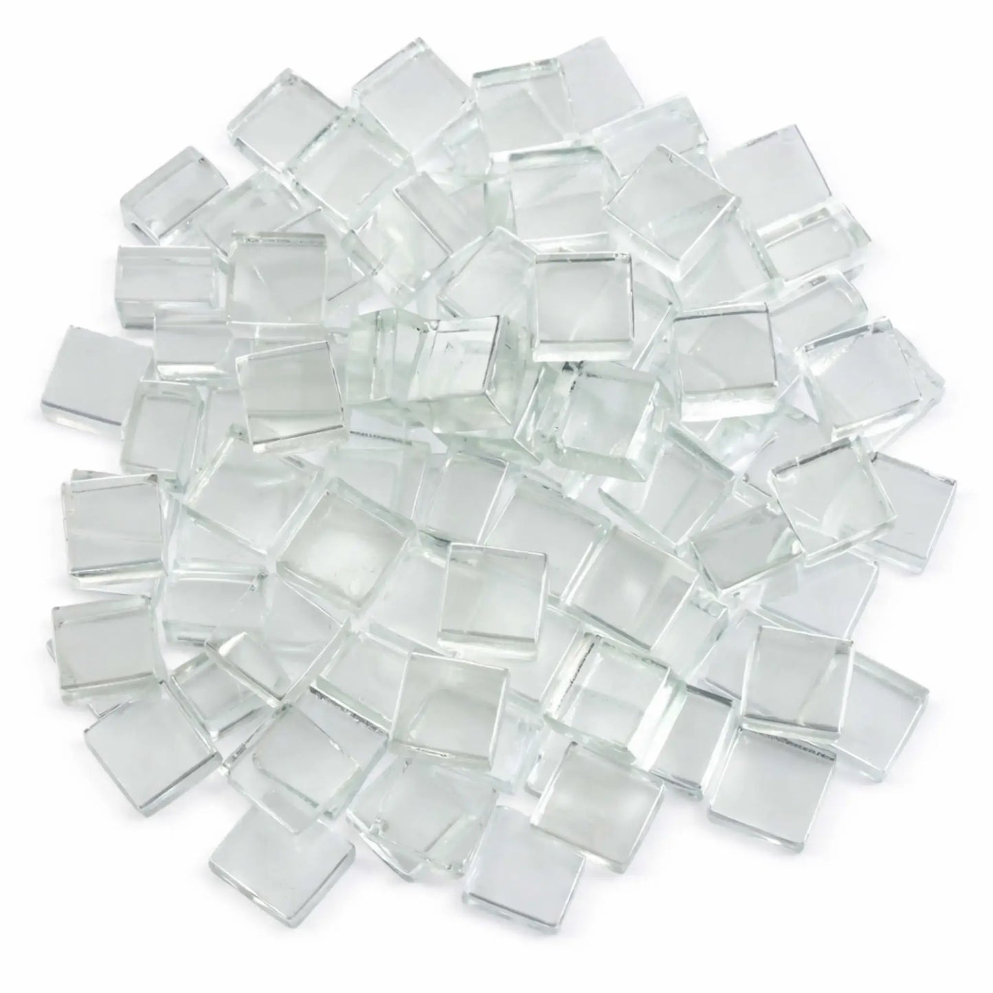 Top-down view of Starfire clear white half-inch tempered fire glass cubes arranged in a loose circular pile on a white surface. The clear, ice-like cubes display a smooth, reflective finish that adds sparkle and modern appeal to gas fire pits and fireplaces.