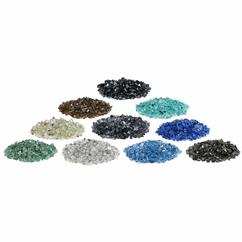 Assorted collection of American Fire Products 1/2 inch premium reflective fire glass in multiple colors including Azuria blue, black, copper, gold, gray, cobalt, Pacific blue, evergreen green, Starfire ultra clear, titanium, and bronze, arranged in separate piles on a white background to showcase color options.