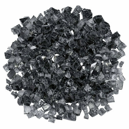 Overhead view of American Fire Products 1/2 inch premium reflective gray fire glass arranged in a circular mound, highlighting the cool smoky tone, faceted tempered fragments, and reflective coating designed to enhance flame shimmer.